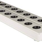 NFT hydroponic channel close-up showing plant slots, UAE Hydroponics